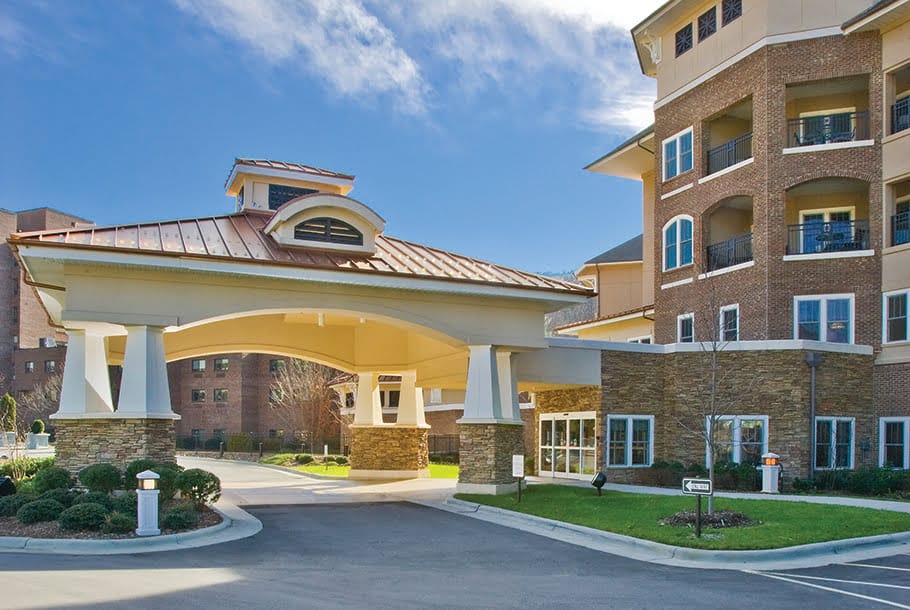 Modern senior living community entrance exterior