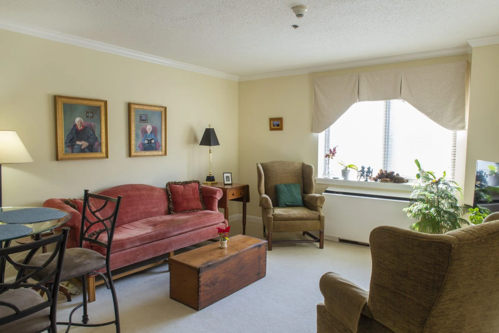 Cozy living room with sofa and armchairs