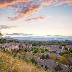 Mountain resort community at colorful sunset